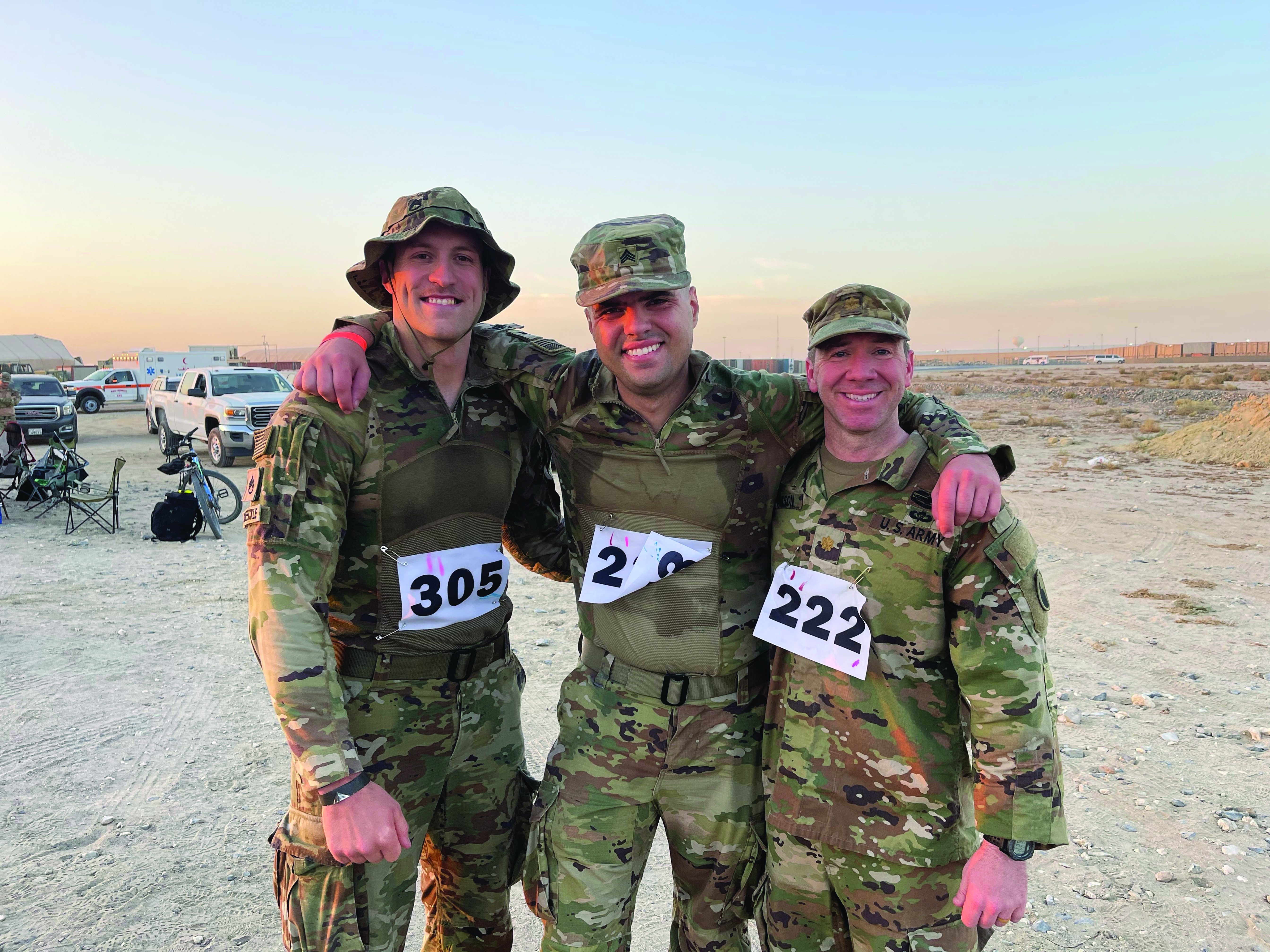 On 13 November 2021, members of the Camp Arifjan JAG office completed the Norwegian Foot March, an 18-mile foot march with 25-pound ruck. Pictured L to R: SSG Zane Schmeeckle, SGT Michael O’Neil, and MAJ John Parson. Not pictured: CPT Thomas Wisniewski.